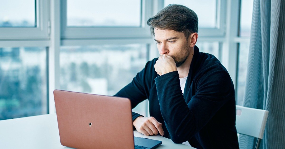 A professional working remotely on a laptop in the United States